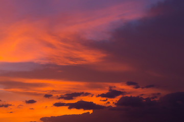 Obraz premium colorful dramatic sunset sky with orange cloud, twilight sky