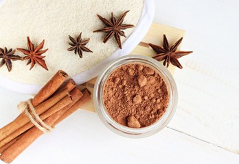 Natural beauty care products. Cinnamon or cacao powder for skin treatment. 