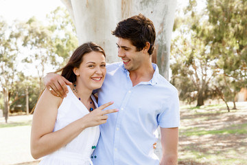 Naklejka premium Young couple in the park