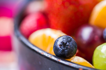 dish full various fresh colorful fruits
