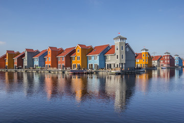 Fototapeta na wymiar Colorful houses at the Reitdiephaven in Groningen