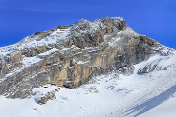 Fototapeta na wymiar View on Mt. Titlis in Switzerland on a windy day