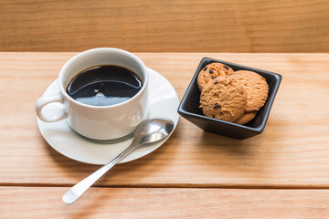 Chocolate chips cookies with white cup of coffee 2