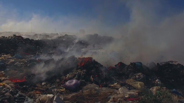 Big Heap Of Garbage Burning At Landfill