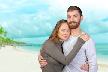 Cheerful young couple standing