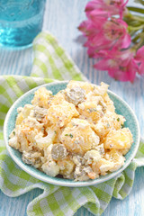 Potato salad with sour cream sauce