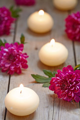 Fototapeta na wymiar Spa theme with candles and flowers