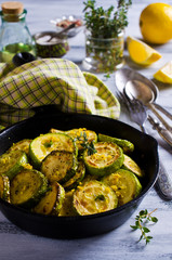 Fried zucchini with lemon zest