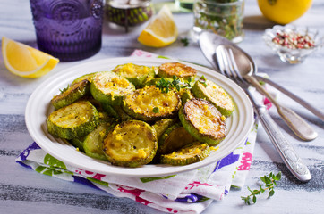 Fried zucchini with lemon zest
