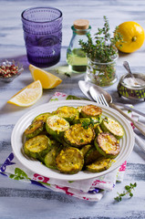 Fried zucchini with lemon zest