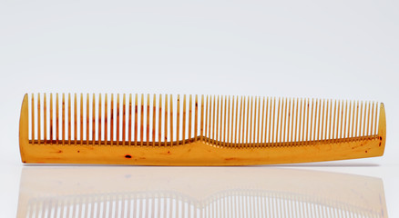 isolated brown comb