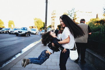 walk mother with a child on the street