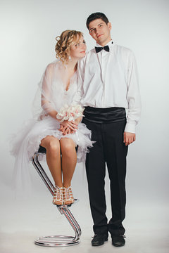 couple of bride and groom covered with veil
