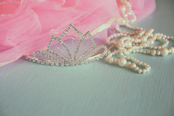 Wedding vintage crown of bride, pearls and pink veil. wedding concept. vintage filtered. selective focus. vintage filtered © tomertu