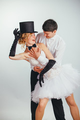   groom lifts in arms blonde bride