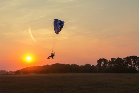 Paragliding into the sunset