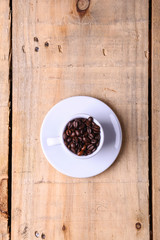 Coffee beans in a cup