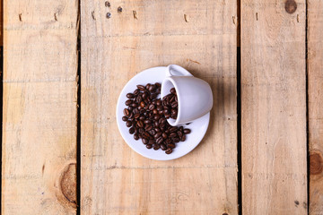 Coffee beans on a saucer