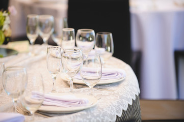 Glasses and Lace Tablecloth