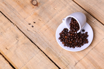 Coffee beans on a saucer