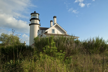 Fototapeta na wymiar Sun Illuminates Highland Lighthouse on Cape Cod