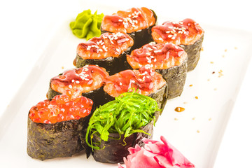 Sushi set on plate isolated on white background
