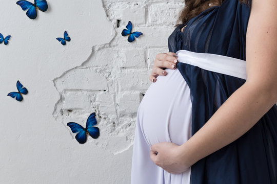 pregnant woman and butterfly