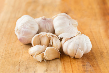 Garlic on wood background