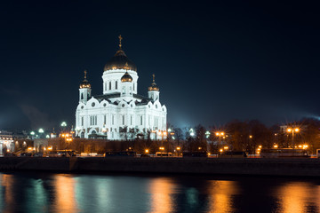 Fototapeta na wymiar Night view on the Cathedral of Christ the Savior from another side of the river from embankment, Moscow 2015