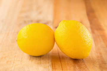 Lemons on wood background selective focus