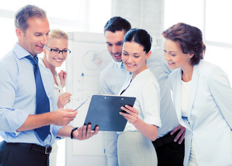 business team discussing something in office