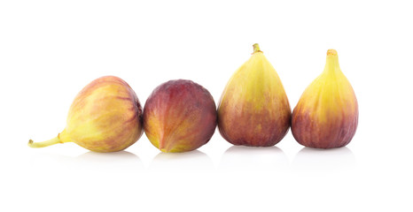 Ripe figs on a white background