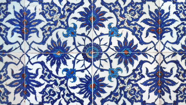 Zooming on the traditional blue Turkish tiles in the mosque in Istanbul Turkey.