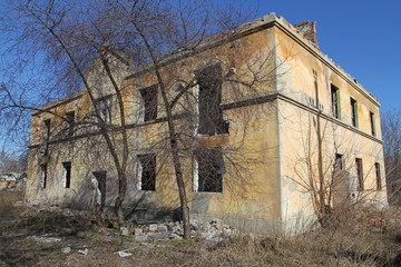 Ruins of an old ruined house. Derelict house in the spring.