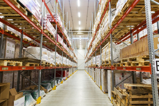 cargo boxes storing at warehouse shelves