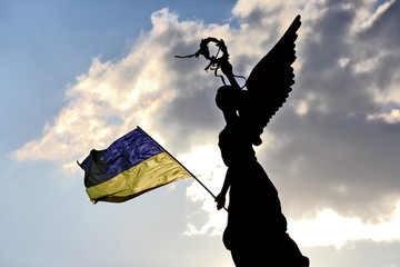 the silhouette of the monument of independence in Kharkov, Ukrai