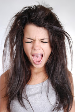 Young Girl With Messy Hair Screaming