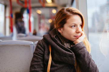Young woman riding in public transport © marjan4782