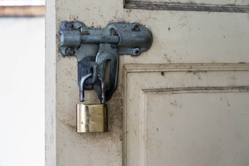 lock master on old white door