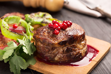 Grilled Steak Meat on the wooden surface