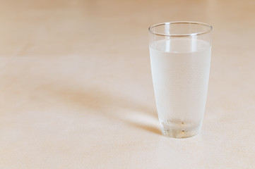 A glass of cold drinking water