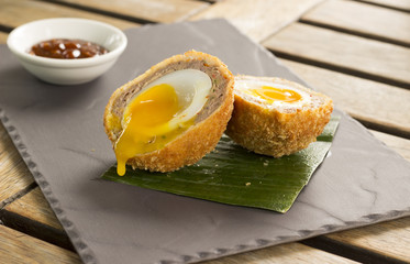 Stunning duck confit scotch egg, yaniniku dipping sauce 