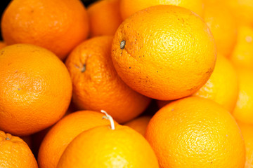 Many oranges on the counter market