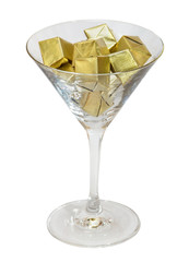 Chocolate candies in the wine glass  isolated on white background