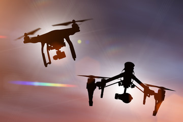 Drone with 4K camera flying.