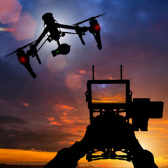Drone with 4K camera flying. - obrazy, fototapety, plakaty