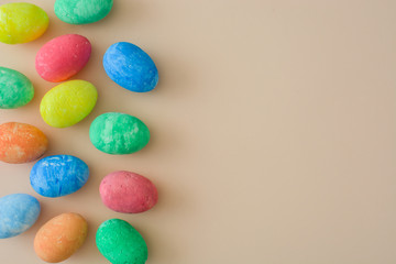 Fototapeta na wymiar Easter eggs on a beige background 