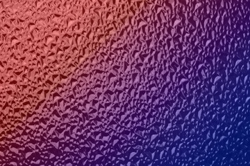 Corrugated glass surface tinted blue and red color