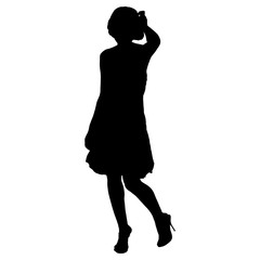 beautiful woman in dress poses on a white background