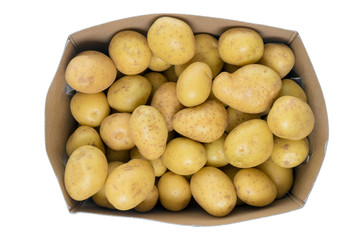 Potato / many potatoes in a box isolated over a white background